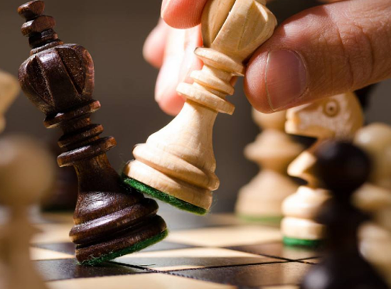 王冠国际象棋——提高学生棋艺和培养学生创造能力