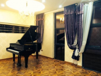 周广仁钢琴艺术中心加盟费用是多少呢？